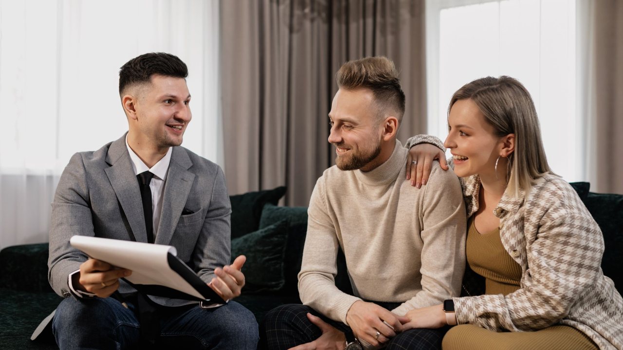 Athertons estate agent discussing a property valuation with homeowners